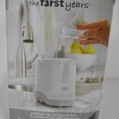The First Years 2-in-1 Simple Serve Bottle Warmer And Pacifier Sanitizer
