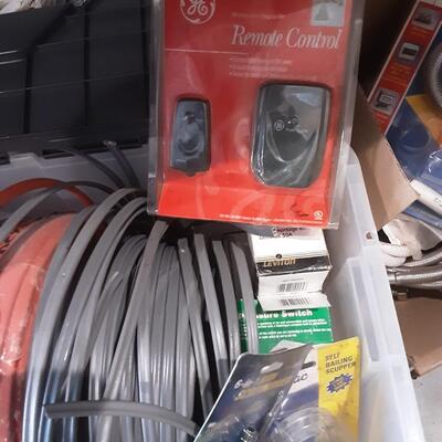 lot 257 - Bin of assorted electrical parts, cable as shown