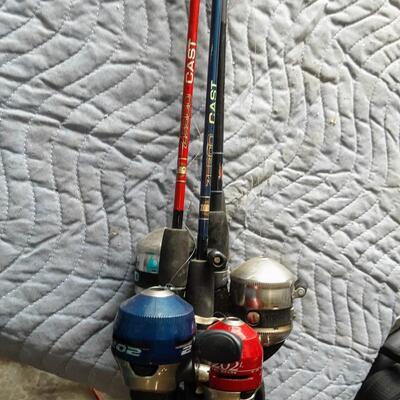 4 fishing rods and reels