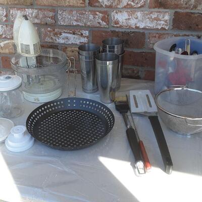 Round bin of asstd dishes, stand mixer, utensils, etc.