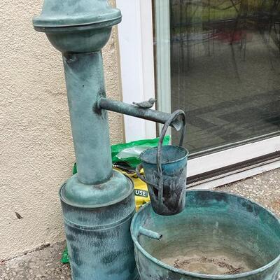 Galvanized metal water pump and bucket