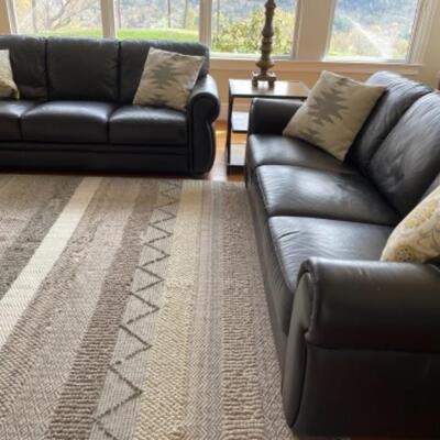 Like new leather sofa, two available. 