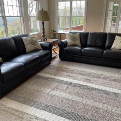 Like new leather sofa, two available. 