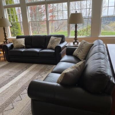 Like new leather sofa, two available. 