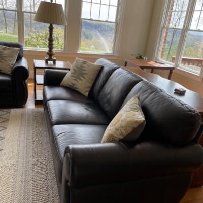 Like new leather sofa, two available. 
