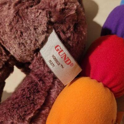 Lot 33: GUND Baby Squeeze and Light Color Worm + New YORRICK Plush Bear 