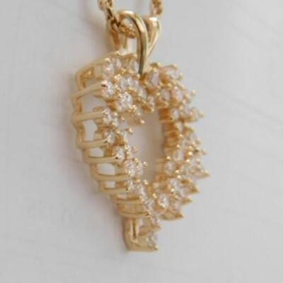 14 KT Gold Heart Pendant Accented by Cubic Zirconia with 24