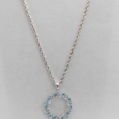 14 KT White Gold Circle Topaz and Diamond Pendant on 14KT Gold Rope Chain 4 grams