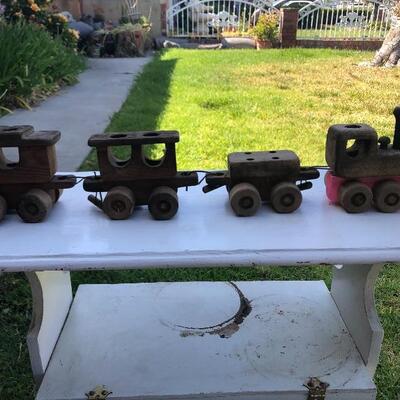 Wooden train, carved, primitive and weathered