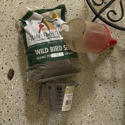 Lot 209 - Garden Decor and Bird Seed