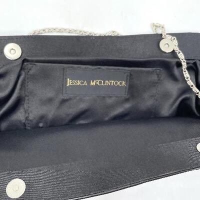 JESSICA MCCLINTOCK ANIMAL PRINT CLUTCH BAG