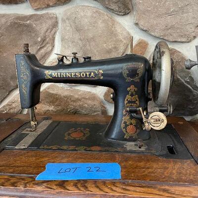 Lot 22 - Antique Minnesota Sewing Machine Ensemble