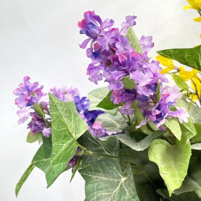FAUX SPRING FLOWERS IN CERAMIC GRAPE WATERING CAN