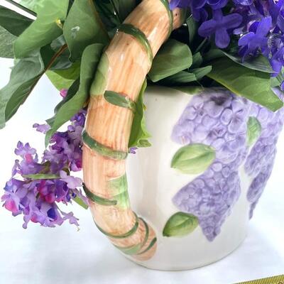 FAUX SPRING FLOWERS IN CERAMIC GRAPE WATERING CAN