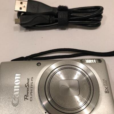Lot 243 - Canon Powershot Camera, Remotes & Phones