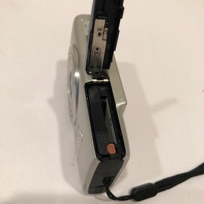 Lot 243 - Canon Powershot Camera, Remotes & Phones