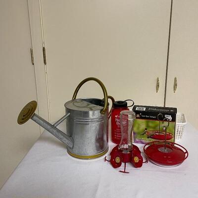 Lot 247 - Hummingbird Feeder & Watering Can