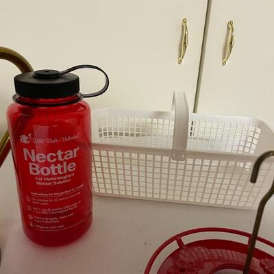 Lot 247 - Hummingbird Feeder & Watering Can