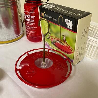 Lot 247 - Hummingbird Feeder & Watering Can