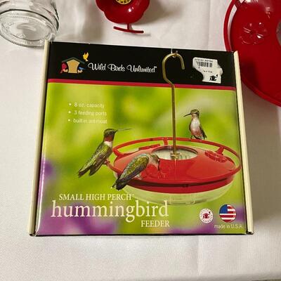Lot 247 - Hummingbird Feeder & Watering Can