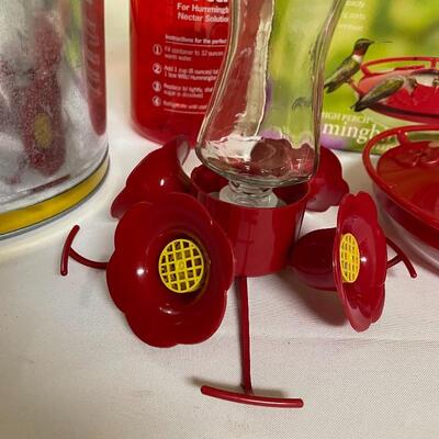 Lot 247 - Hummingbird Feeder & Watering Can