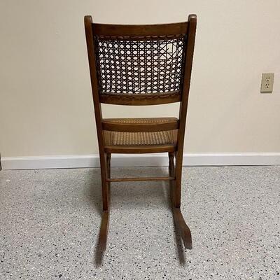 Lot 251 - Small Wooden Rocker w/ Cane Seat & Back