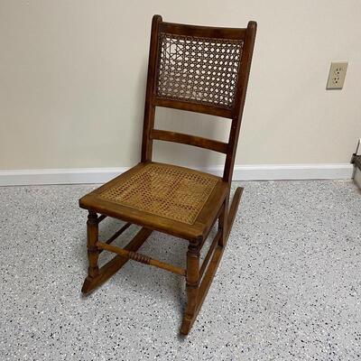 Lot 251 - Small Wooden Rocker w/ Cane Seat & Back