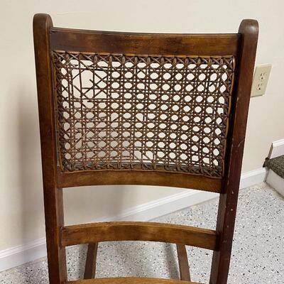 Lot 251 - Small Wooden Rocker w/ Cane Seat & Back