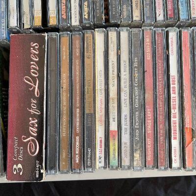 Lot 68 - Books, Cd's, DVD's, Cassetes and a Carry Case 