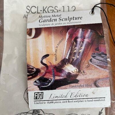 Lot 98 -Limited Edition Metal Cowboy Boot with Snake Garden Sculpture