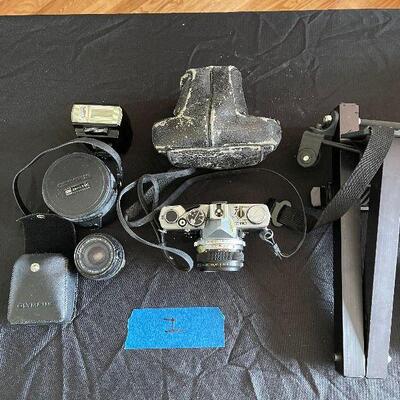 Lot 123 - Vintage Olympus Camera And Lenses