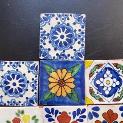 Lot 26LD. Mexican Talavera ceramic tilesâ€”ten 4â€x4â€ and twenty 2â€x2â€, all adapted for wall hanging--$125