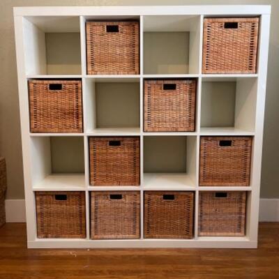 Lot 72BR. One book shelf with 10 basketsâ€”Ikeaâ€”59â€L x 15-1/4â€D x 50â€T (shelf); 12-1/2â€L x 12-1/2â€H x 13-1/2â€D...
