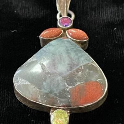 Lot 77LD. Assorted sterling silver and gemstone pendants--$75