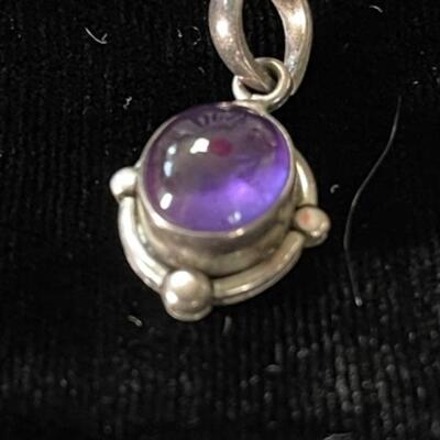 Lot 77LD. Assorted sterling silver and gemstone pendants--$75