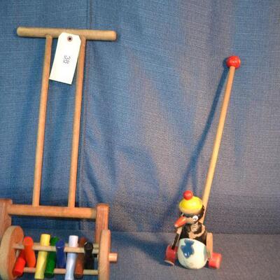 LOT 38 two vintage push toys one needs repair
