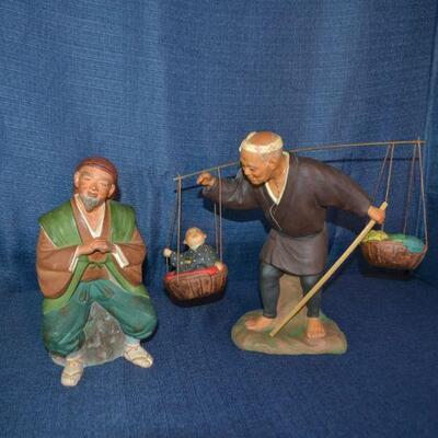 LOT 111. Vintage porcelain mudmen