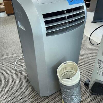 Lot 143 - Air Conditioner and Space Heater
