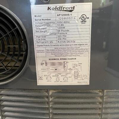 Lot 143 - Air Conditioner and Space Heater