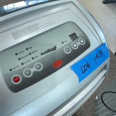 Lot 143 - Air Conditioner and Space Heater