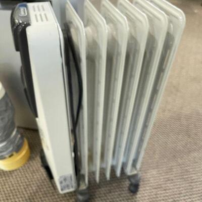 Lot 143 - Air Conditioner and Space Heater