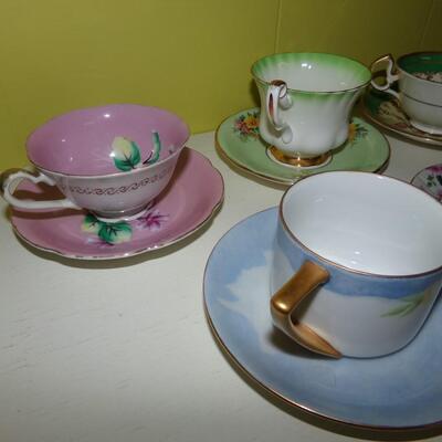 LOT 80  BONE CHINA CUPS AND SAUCERS