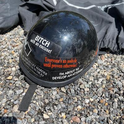 Lot 194 - Harley-Davidson Rain Suits and Helmets
