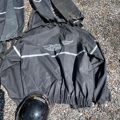 Lot 194 - Harley-Davidson Rain Suits and Helmets