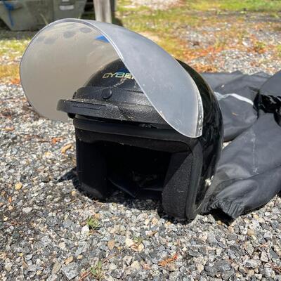 Lot 194 - Harley-Davidson Rain Suits and Helmets