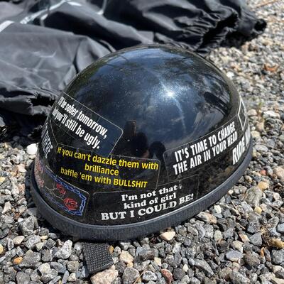 Lot 194 - Harley-Davidson Rain Suits and Helmets