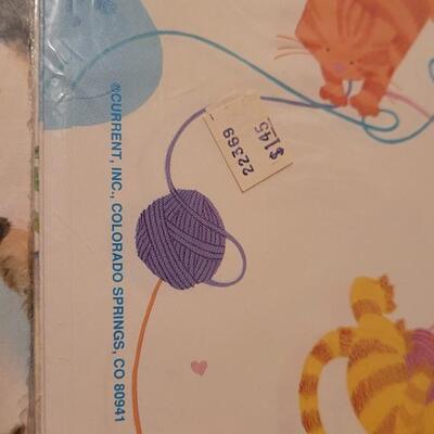 Lot 149: Assorted NEW Sealed Gift Wrap Paper 
