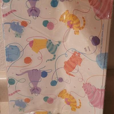 Lot 149: Assorted NEW Sealed Gift Wrap Paper 