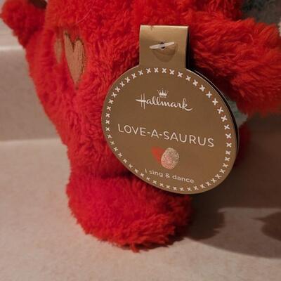 Lot 153: New LOVE-A-SAURUS Hallmark Plush - Needs Batteries 