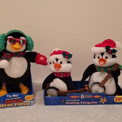 Lot 181: Animated Penguin & Dueling Penguins